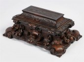 AN ITALIAN BAROQUE STYLE WOOD