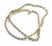 An Italian bicolour twist neck