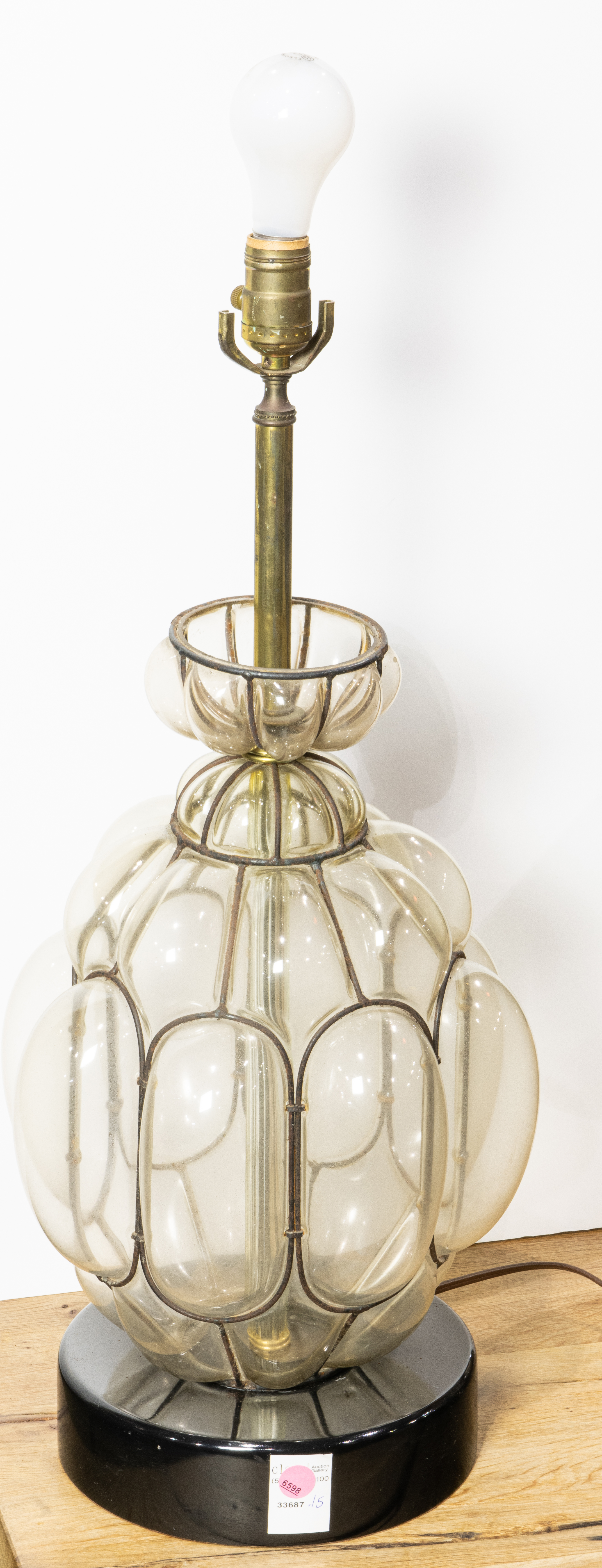 AN ITALIAN CAGED GLASS TABLE LAMP