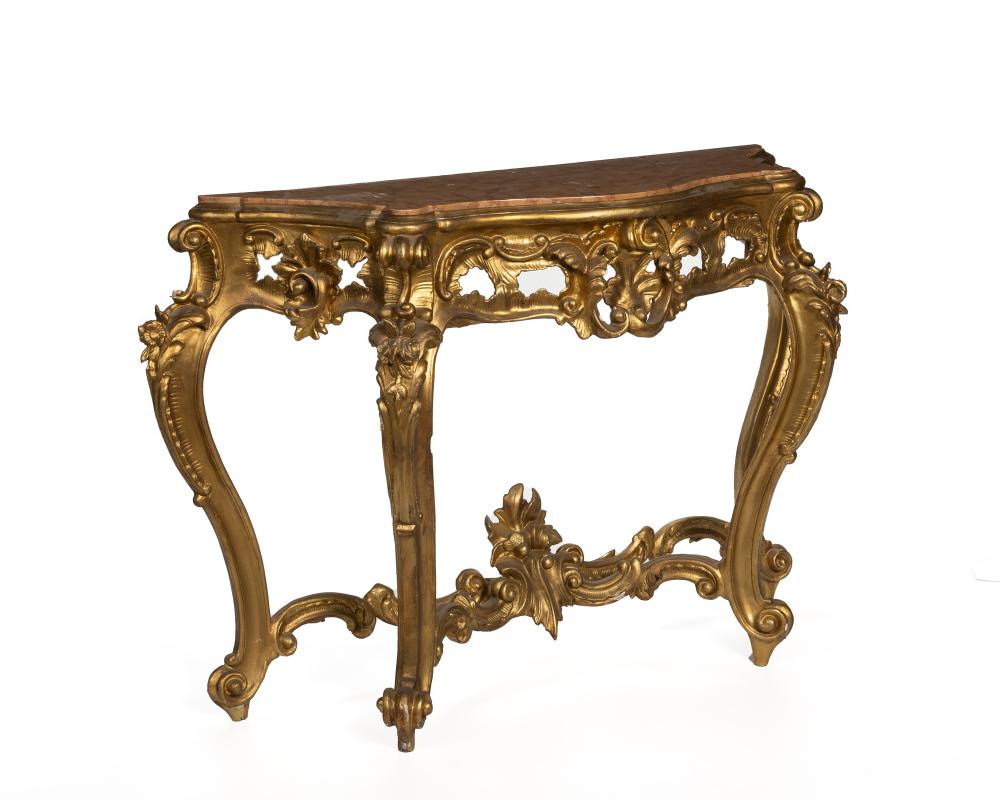 AN ITALIAN CARVED GILTWOOD