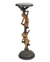 AN ITALIAN CARVED GILTWOOD STA