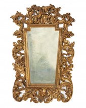 AN ITALIAN CARVED GILTWOOD WAL