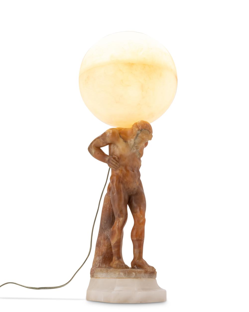 AN ITALIAN CARVED MARBLE AND