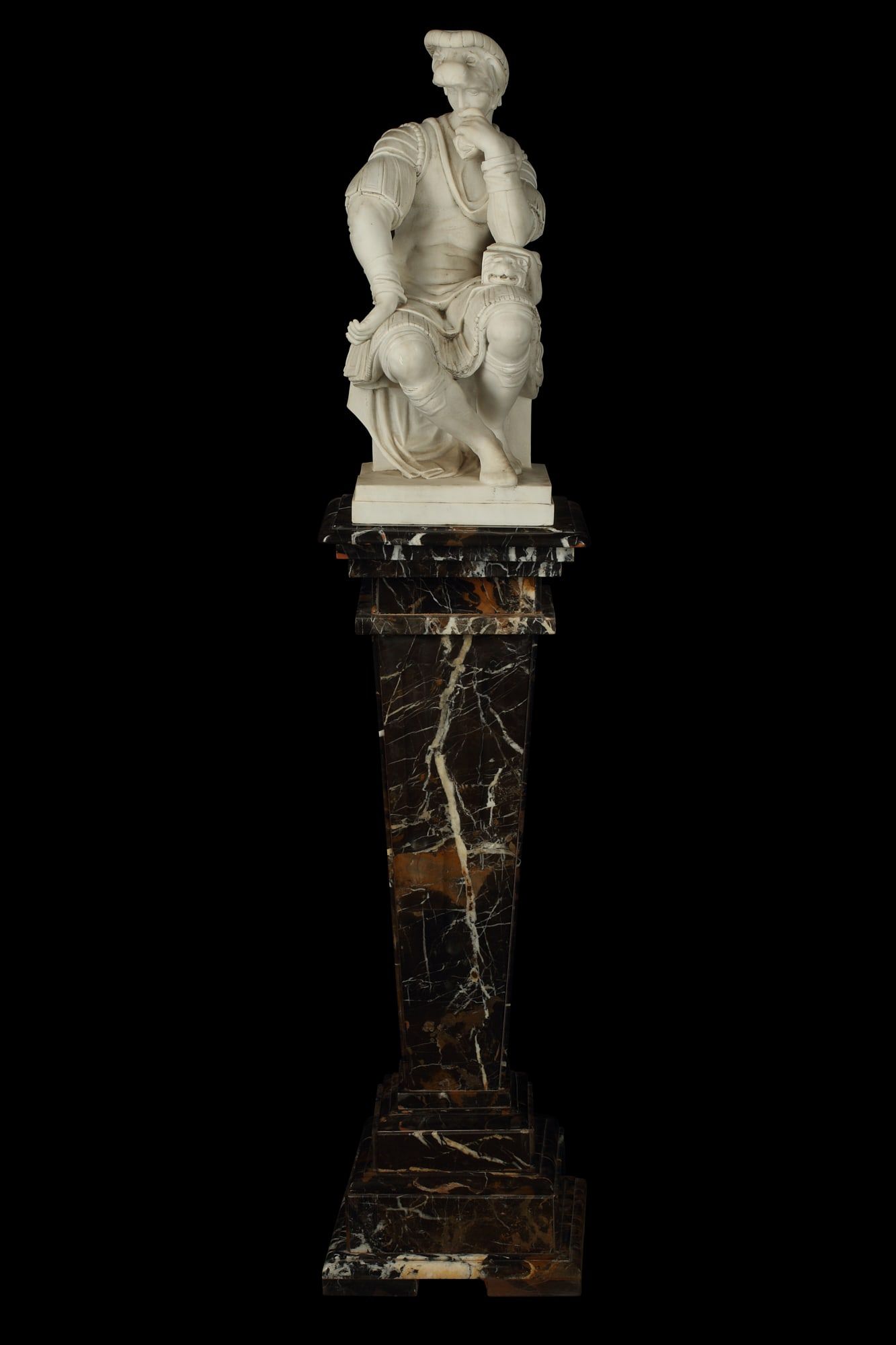 AN ITALIAN CARVED MARBLE FIGURE