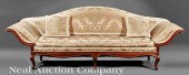 An Italian Carved Walnut Canap
