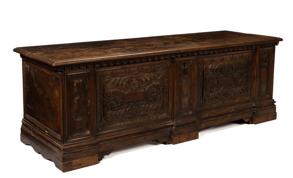 AN ITALIAN CARVED WALNUT