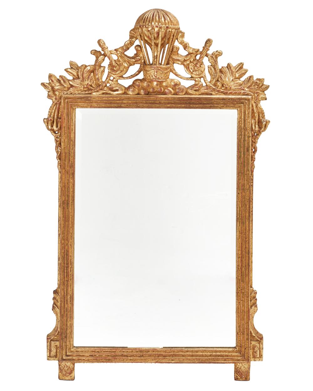 AN ITALIAN GILTWOOD WALL MIRRORAn