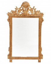 AN ITALIAN GILTWOOD WALL MIRRO