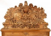An Italian limewood overmantel