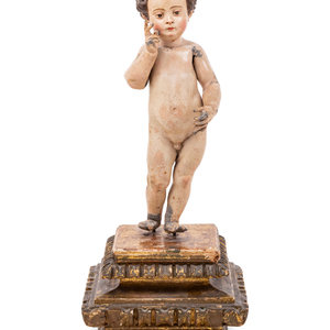 An Italian Painted Putto Figure