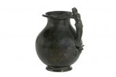 AN ITALIAN PATINATED BRONZE JU