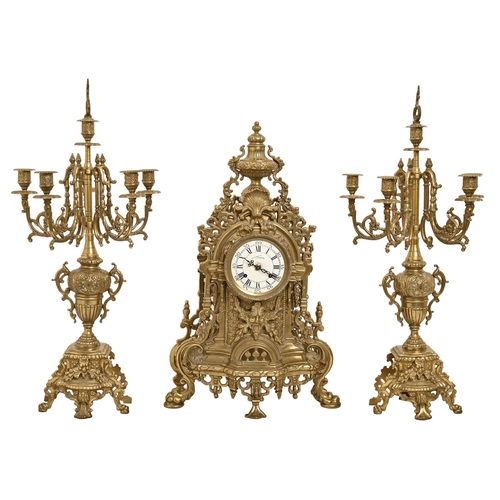 An Italian pierced brass clock