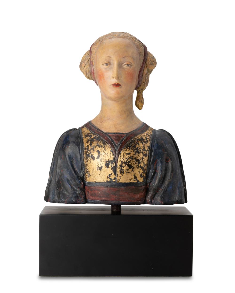AN ITALIAN POLYCHROMED CARVED