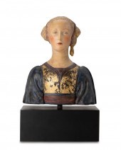 AN ITALIAN POLYCHROMED CARVED