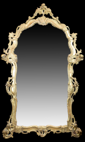AN ITALIAN ROCOCO GILTWOOD MIR
