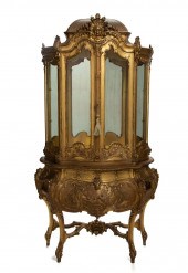 AN ITALIAN ROCOCO-STYLE CARVED