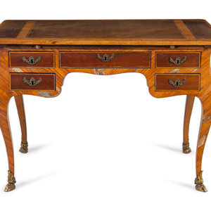 An Italian Rococo Style Gilt