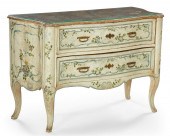 AN ITALIAN ROCOCO WHITE PAINTE