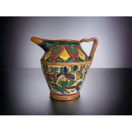 AN ITALIAN SGRAFFITO POTTERY JUG.