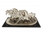 AN ITALIAN SILVER-CLAD SCULPTU