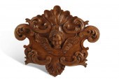 AN ITALIAN STAINED CARVED WALN