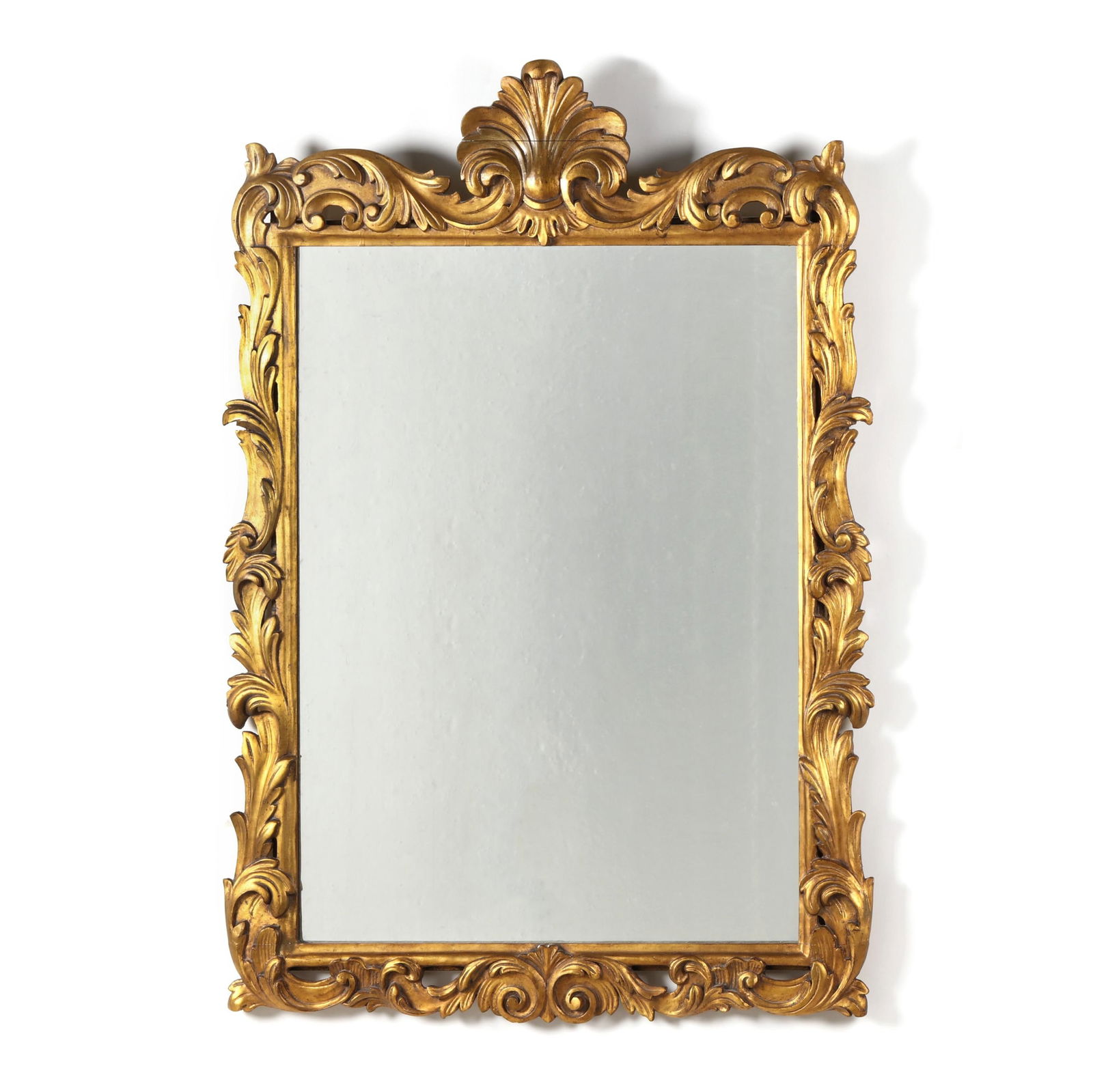 AN ITALIANATE CARVED AND GILT