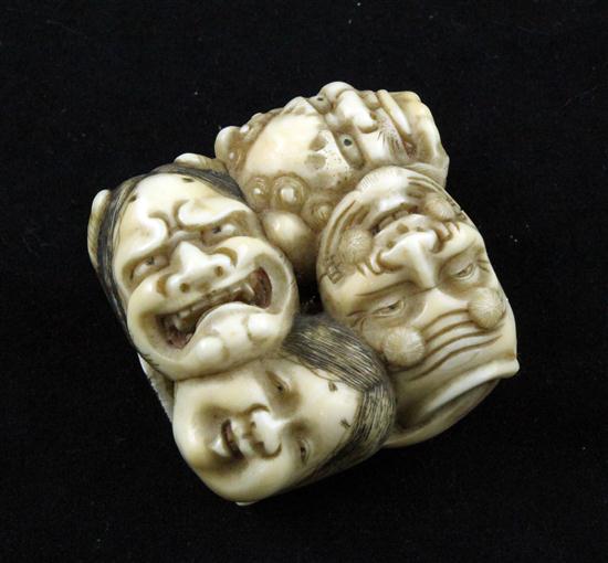 An ivory netsuke carved with