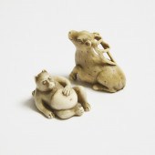 An Ivory Netsuke of a Tanuki a