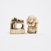 An Ivory Netsuke of a Child Su