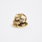An Ivory Netsuke of an Oni Sha