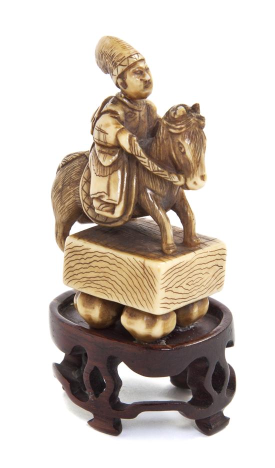 An Ivory Netsuke of Oguri Hangan