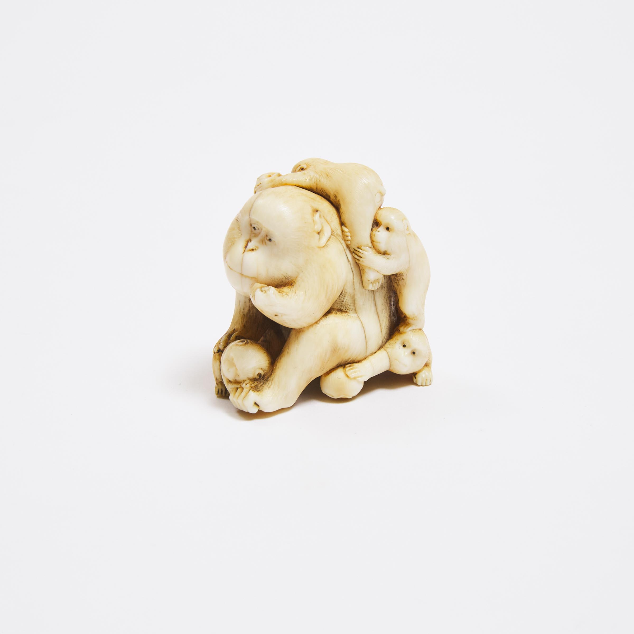 An Ivory Netsuke of Snow Monkeys,