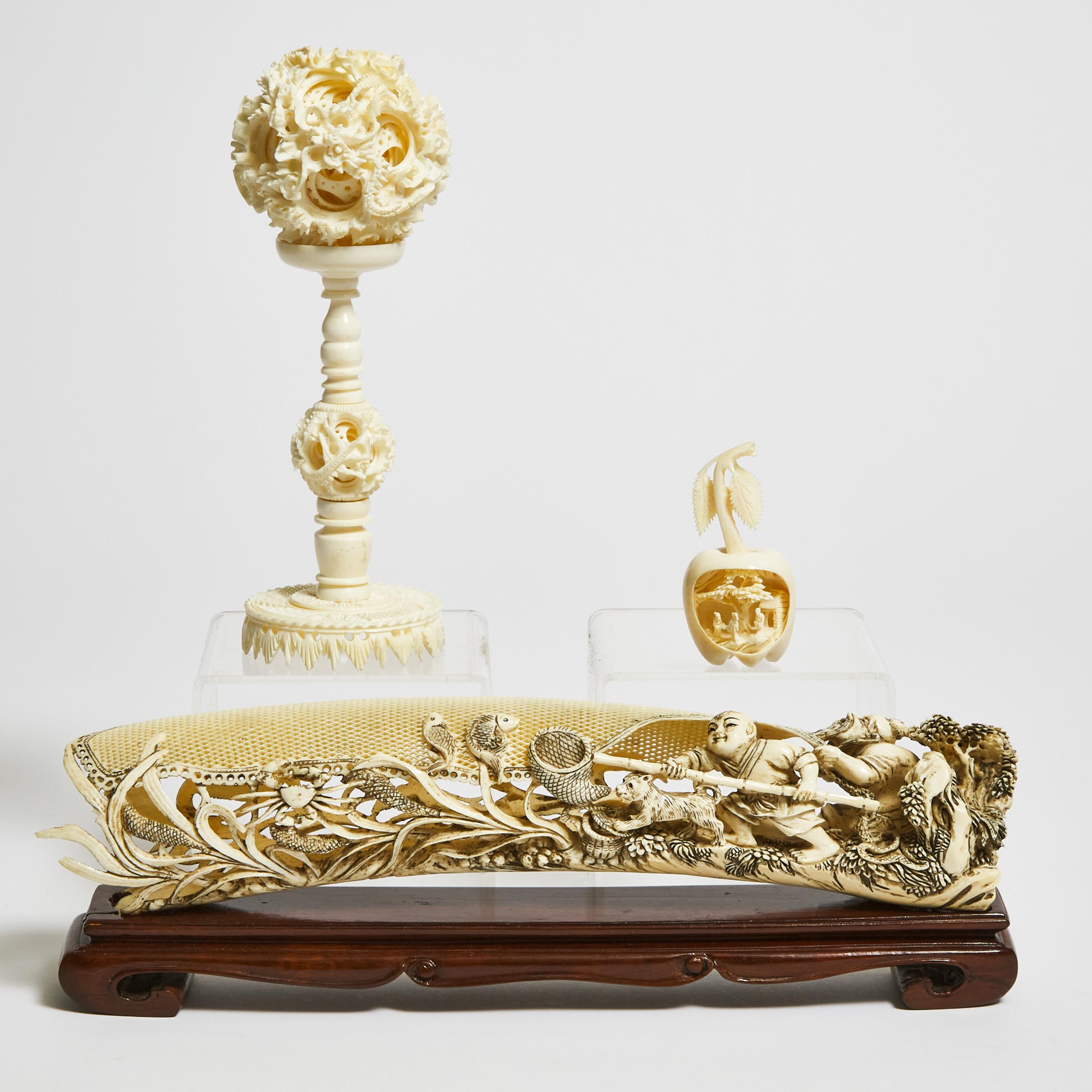 An Ivory Puzzle Ball, Together With