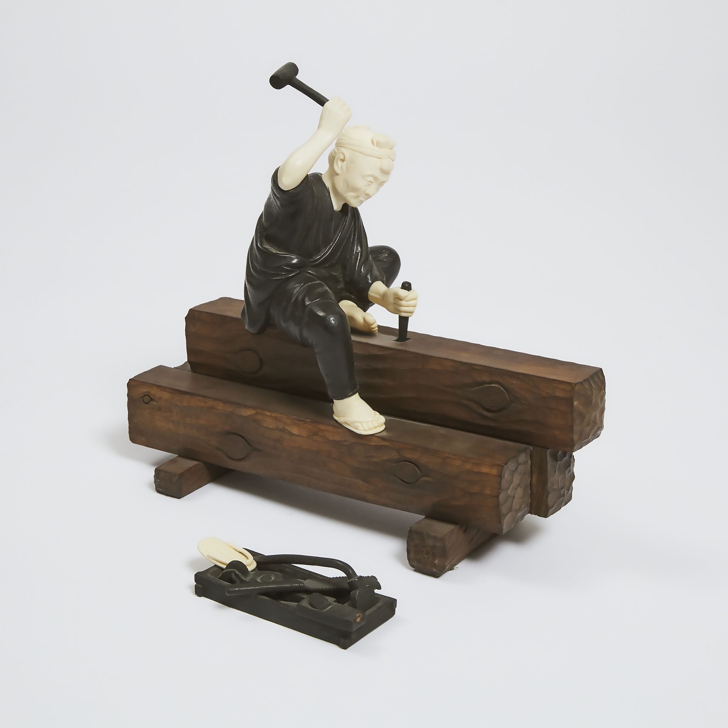 An Ivory, Wood and Bronze Okimono
