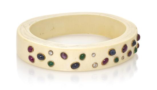 An Ivory Yellow Gold Ruby