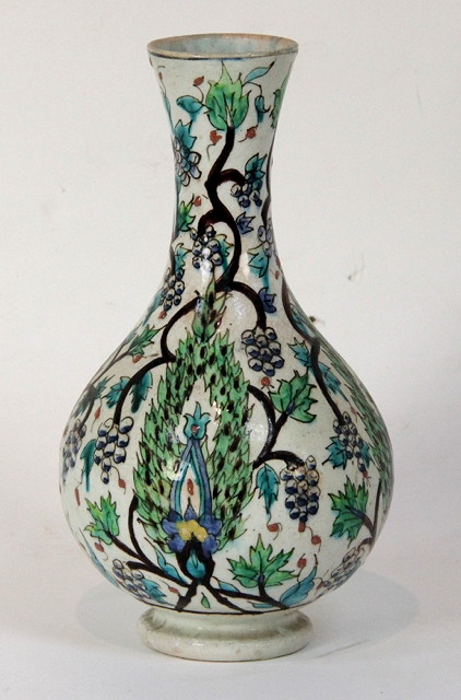 An Iznik style vase decorated