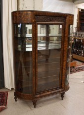 AN OAK AND CURVED GLASS CHINA