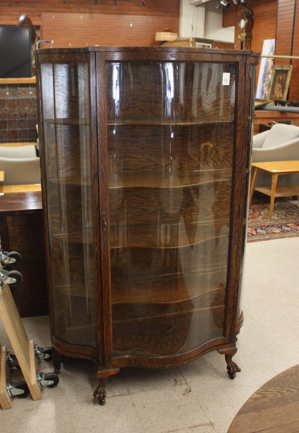 AN OAK AND SERPENTINE CURVED