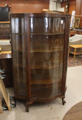 AN OAK AND SERPENTINE CURVED G