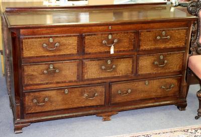 An oak blanket chest with three