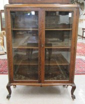 AN OAK BOOKCASE/CHINA CABINET,