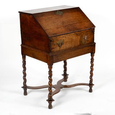 An oak bureau with fitted