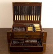 An oak canteen of silver plate