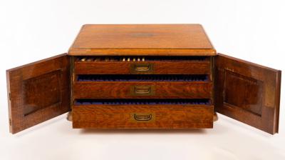 An oak cased canteen of silver