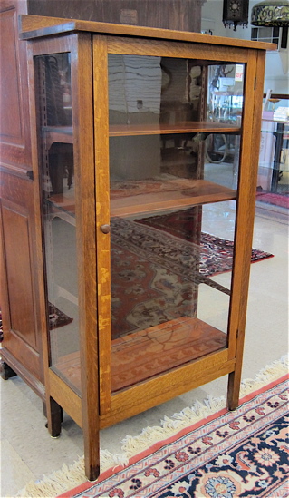 AN OAK DISPLAY CABINET American