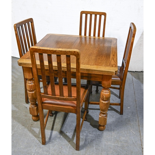 An oak draw leaf dining table, on