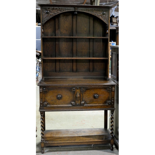 An oak dresser, the boarded rack