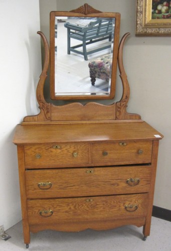AN OAK DRESSER WITH TILT MIRROR