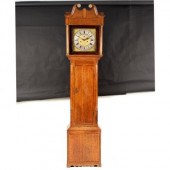 An oak eight-day longcase cloc