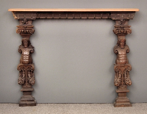 An oak fire surround with moulded